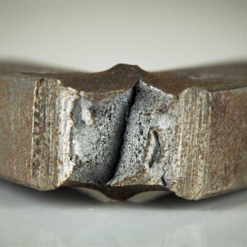 Low carbon steel that has been applied fracture test. Image Credit: Shutterstock.com/bartu