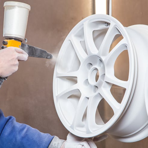 Powder coating automotive wheels. Image Credit: Shutterstock.com/Chris Tefme