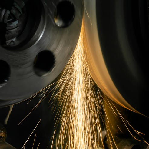 External cylindrical grinding. Image Credit: Shutterstock.com/Dovzhykov Andriy