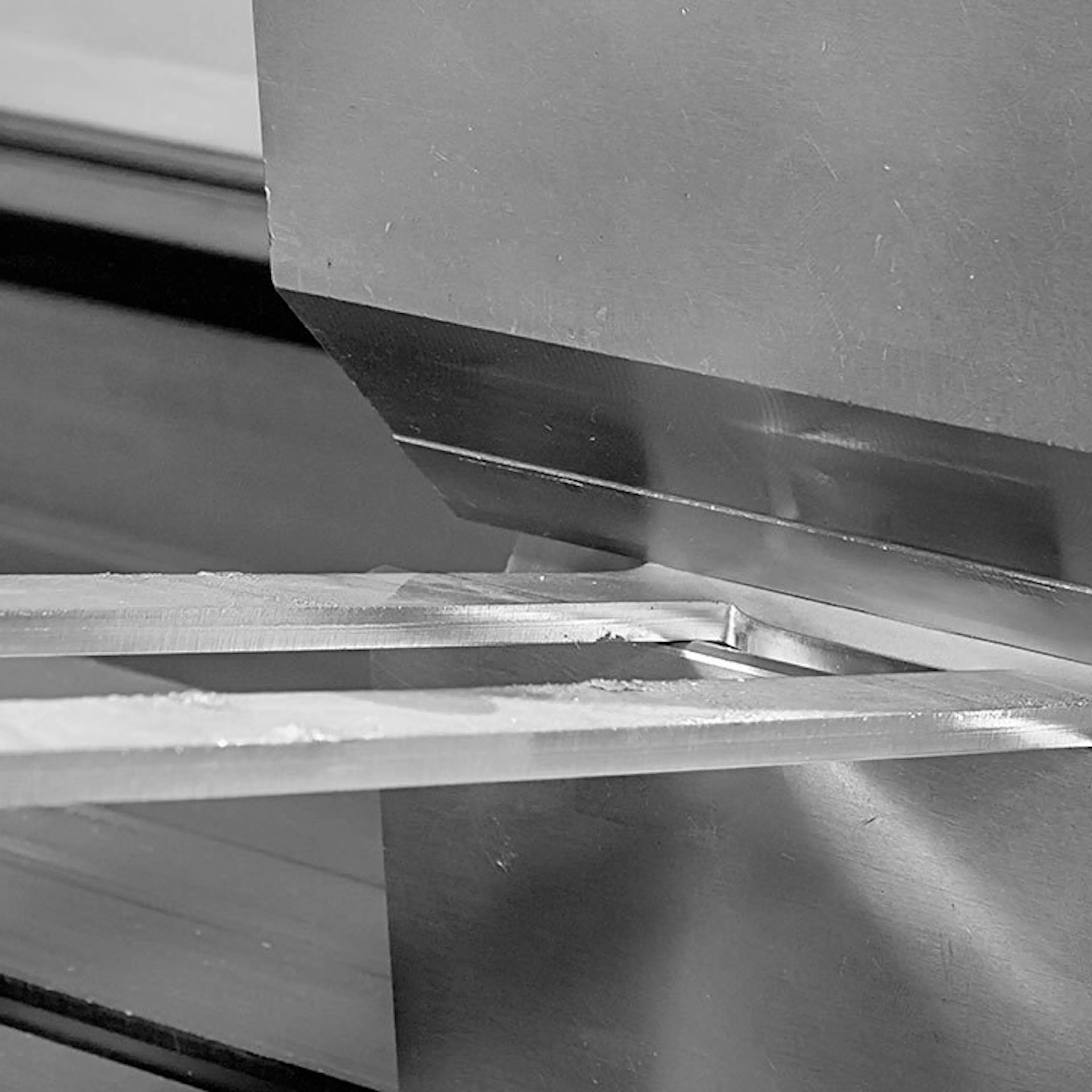 Sheet metal being bent. Image Credit: Shutterstock.com/Dreamsquare