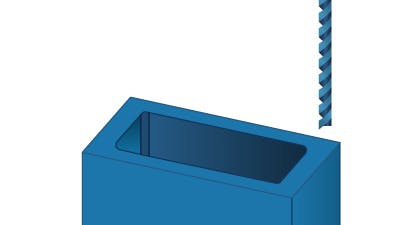 Image of part and drill bit