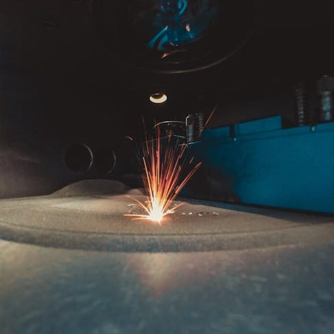 3D printer printing metal. Image Credit: Shutterstock.com/MarinaGrigorivna