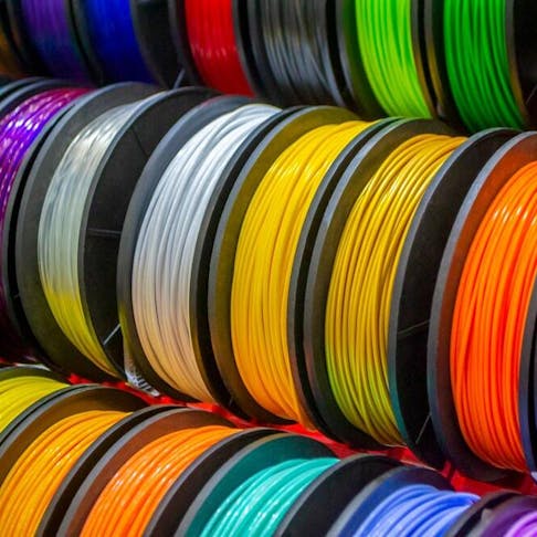 Multicolored filaments of plastic for 3D printing. Image Credit: Shutterstock.com/MarinaGrigorivna