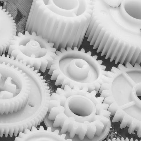 White PBT injection molded gears. Image credit: Zhukov Oleg/Shutterstock
