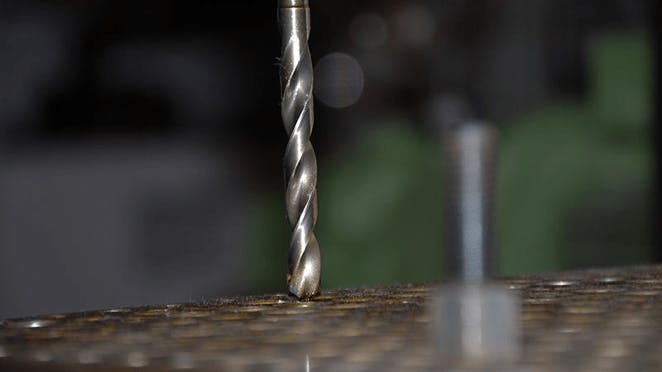 Drilling metal