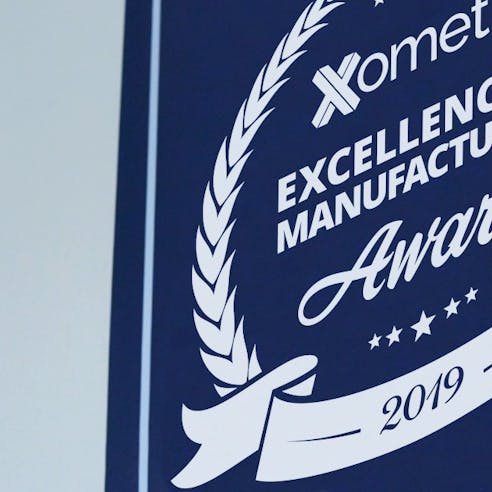 Xometry's Excellence in Manufacturing Award Banner 2019