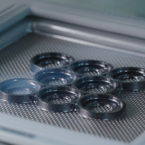 Parts being fabricated using vacuum forming. Image Credit: leungchopan/Shutterstock.com