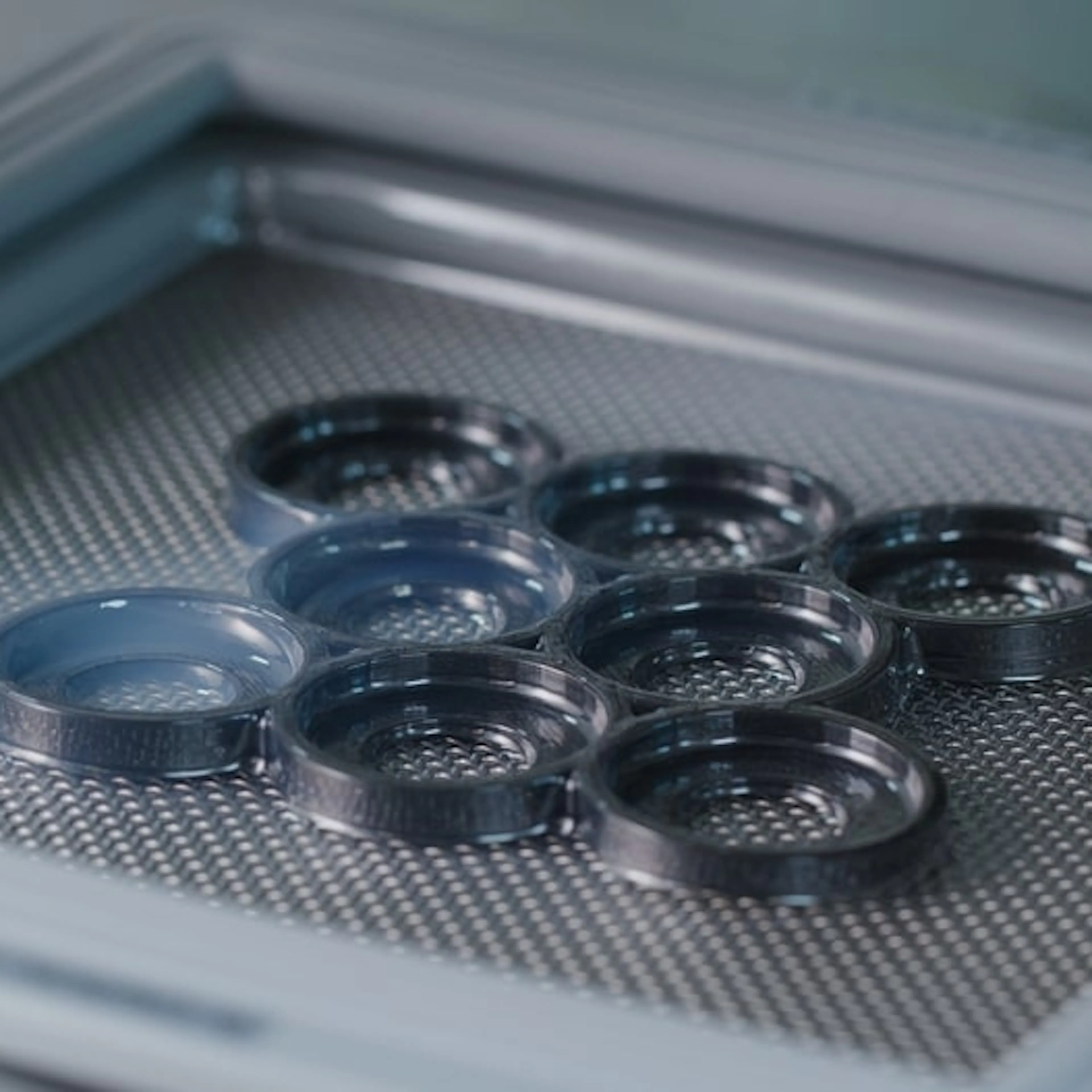 Parts being fabricated using vacuum forming. Image Credit: leungchopan/Shutterstock.com
