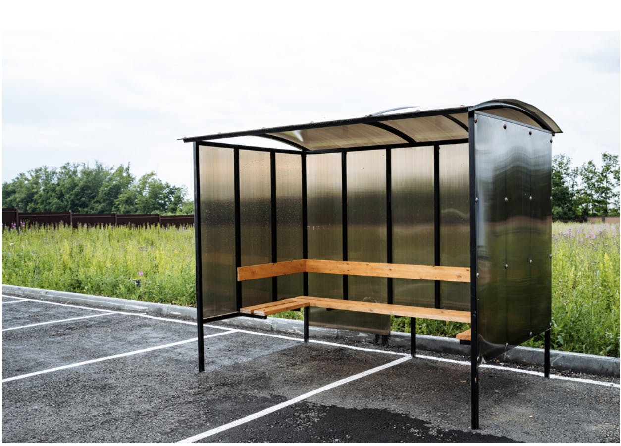 brown polycarbonate bus stop shelter