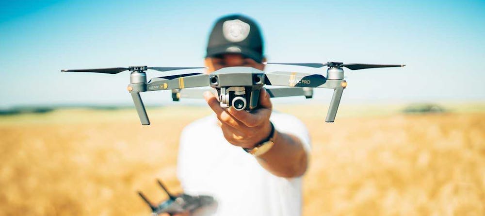 Man holding an advanced drone