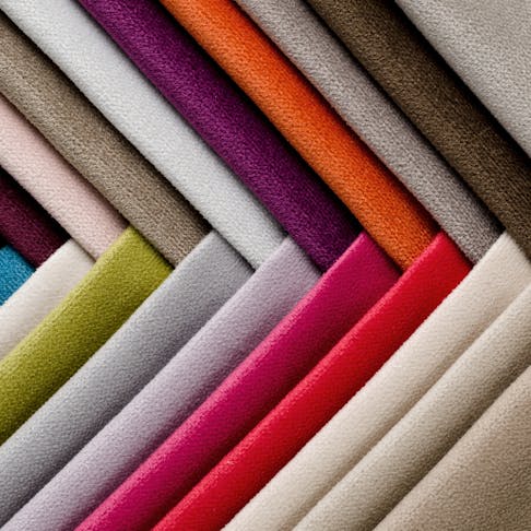Collection of colorful textile samples. Image Credit: Shutterstock.com/Anna Aybetova