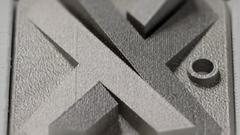 Xometry Logo in Stainless Steel 