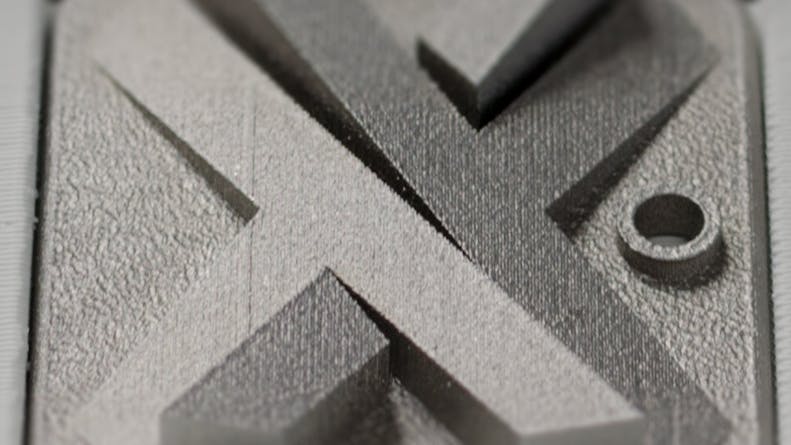 Xometry Logo in Stainless Steel