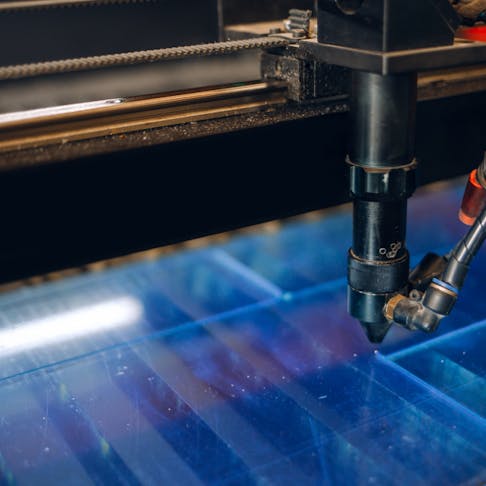 Laser cutting plastic. Image Credit: Shutterstock.com/Innervision Photography