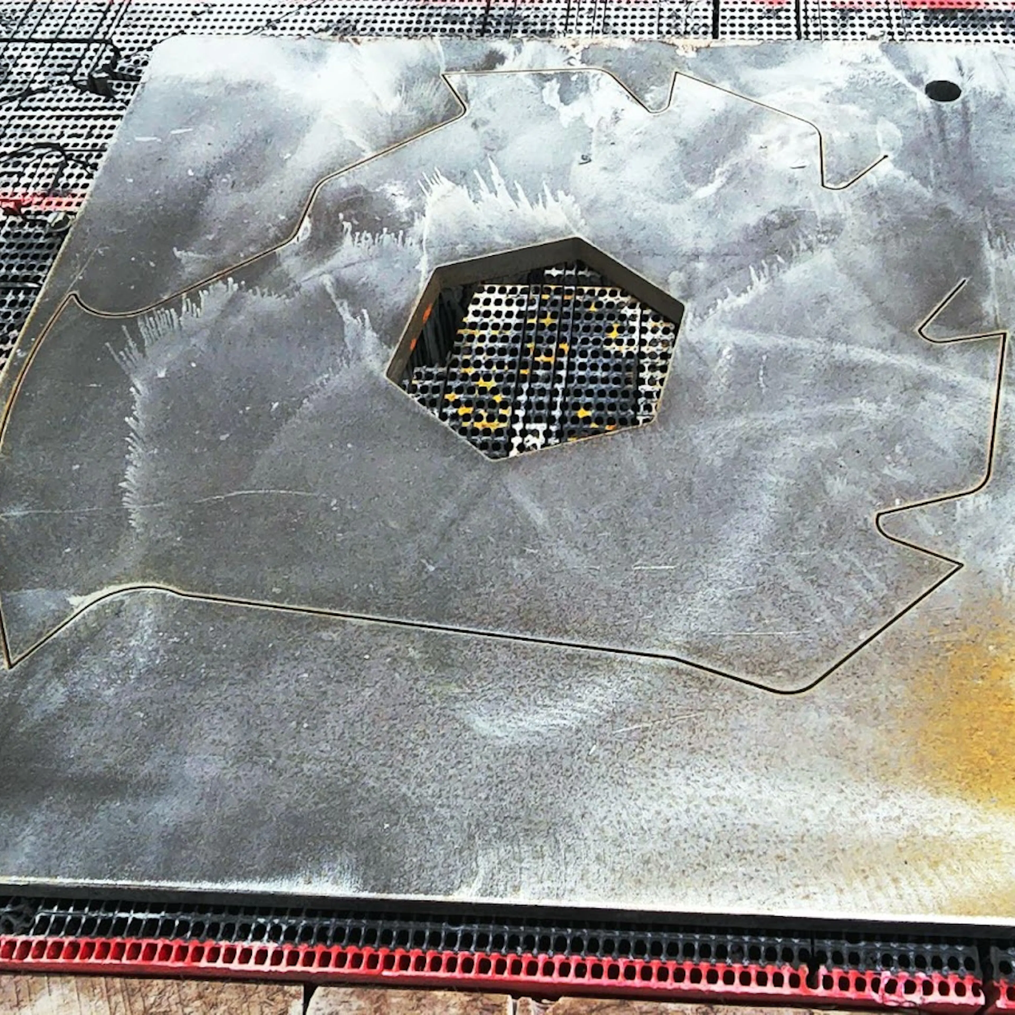 AR steel plate being waterjet cut using Xometry's Waterjet cutting service.