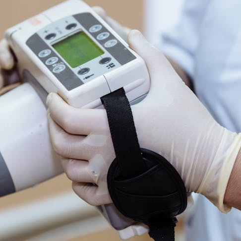 doctor holding medical part
