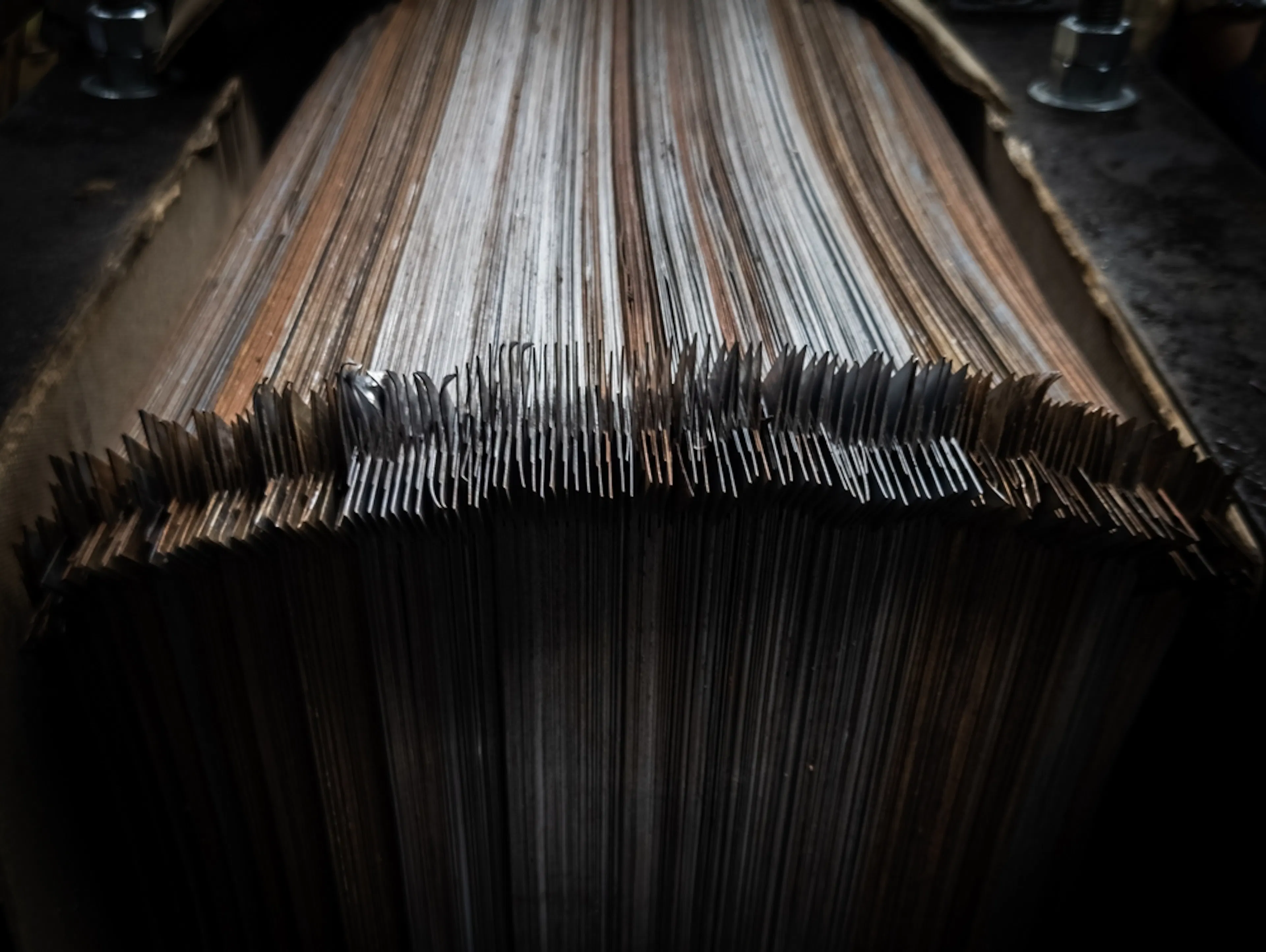 A stack of laminated plates. Image Credit: Shutterstock.com/Anwar Attar