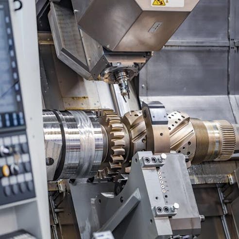 Metalworking CNC lathe milling machine. Image Credit: Shutterstock.com/Andrey Armyagov