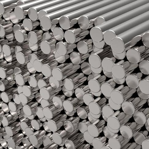 Round metal bars stacked. Image Credit: Shutterstock.com/rimira