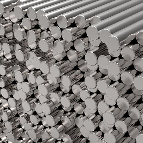 Round metal bars stacked. Image Credit: Shutterstock.com/rimira