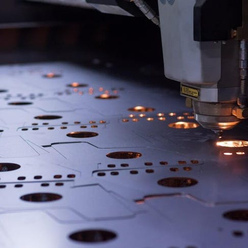 Laser cutting on sheet metal. Image Credit: Shutterstock.com/Denys90