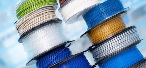 PLA and ABS filament for 3D printing. Image Credit: Shutterstock.com/luchschenF