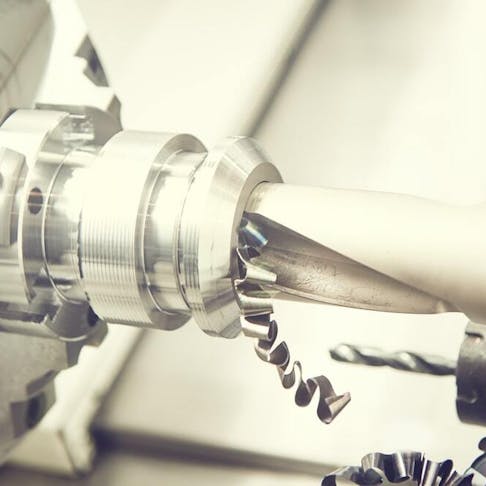 Cutting tool counterboring a hole. Image Credit: Shutterstock.com/Dmitry Kalinovsky