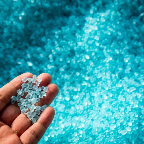 Blue plastic polymer granules. Image Credit: Shutterstock.com/Extarz