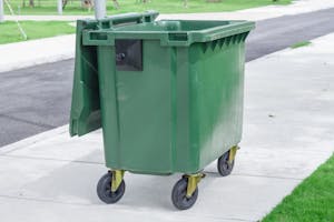 A plastic dumpster created using gas assist injection molding. Image credit: T Wi Rote/Shutterstock