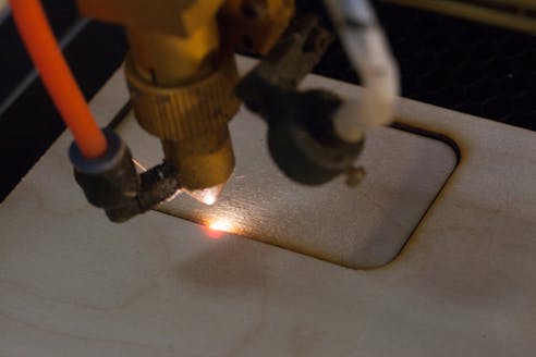 MDF laser cutting. Image Credit: Shutterstock.com/Nikolay Vinokurov