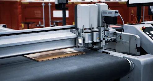 Laser die cut machine. Image Credit: Shutterstock.com/Itsanan