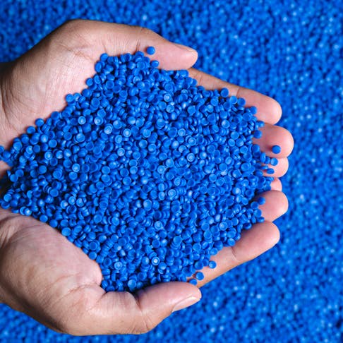 Blue plastic polymer granules. Image Credit: Shutterstock.com/Meaw_stocker
