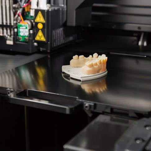 3D printed dental bridge. Image Credit: Shutterstock.com/Andy Dean Photography