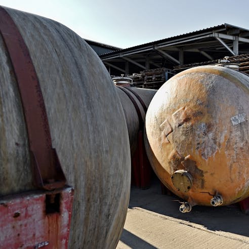 Fiberglass storage tanks. Image Credit: Shutterstock.com/roibu