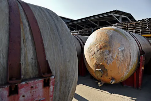 Fiberglass storage tanks. Image Credit: Shutterstock.com/roibu