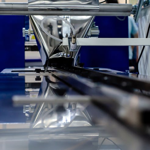 Automated vacuum sealed packaging line. Image Credit: Shutterstock.com/Lutsenko_Oleksandr
