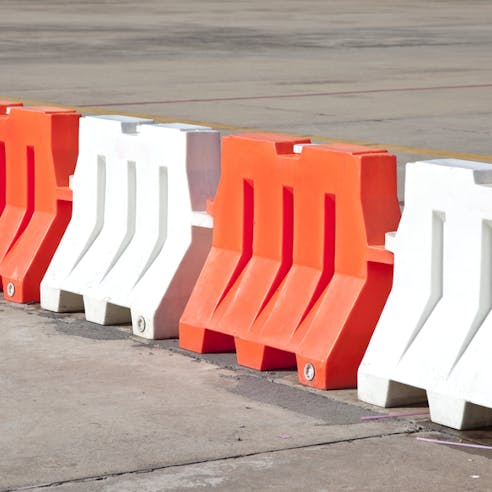 Road barriers. Image Credit: Shutterstock.com/Tawin Mukdharakosa