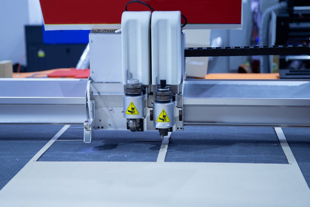 digital laser cutting machine cutting paper