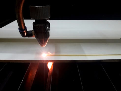 Laser cutting MDF. Image Credit: Shutterstock.com/Edinaldo Maciel