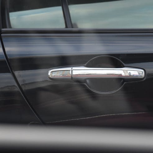 Auto door handle. Image Credit: Shutterstock.com/Omkoi