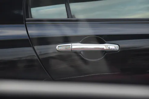 Auto door handle. Image Credit: Shutterstock.com/Omkoi