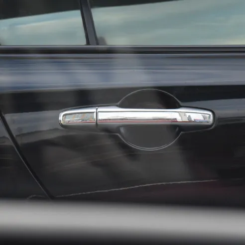 Auto door handle. Image Credit: Shutterstock.com/Omkoi