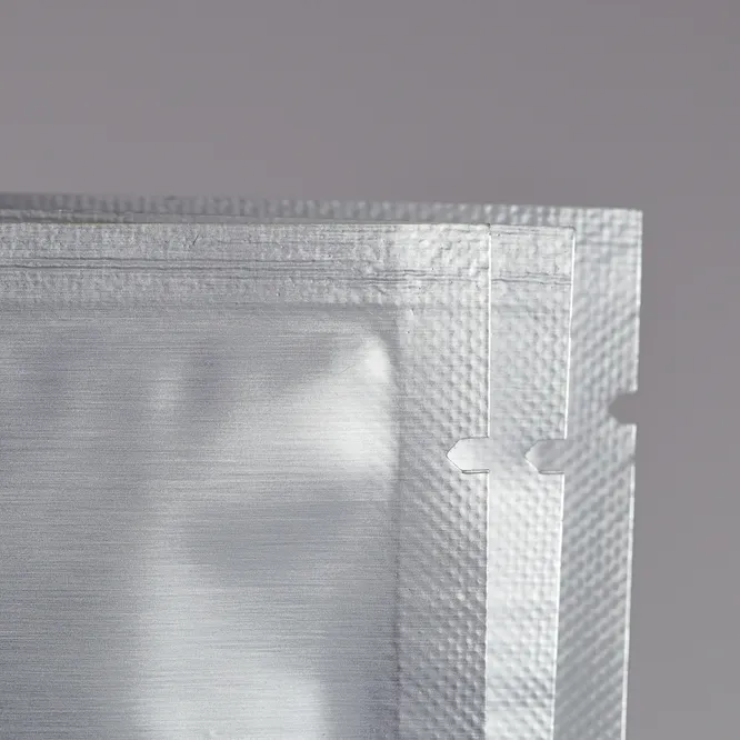 Close up of tear point on sheet foil package. Image Credit: Shutterstock.com/MMXeon