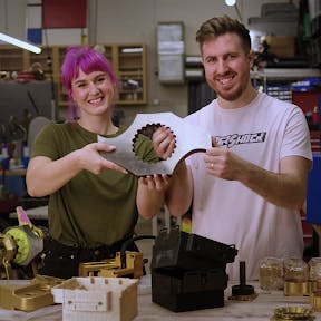Will and Alex Bales holding up a Xometry produced part