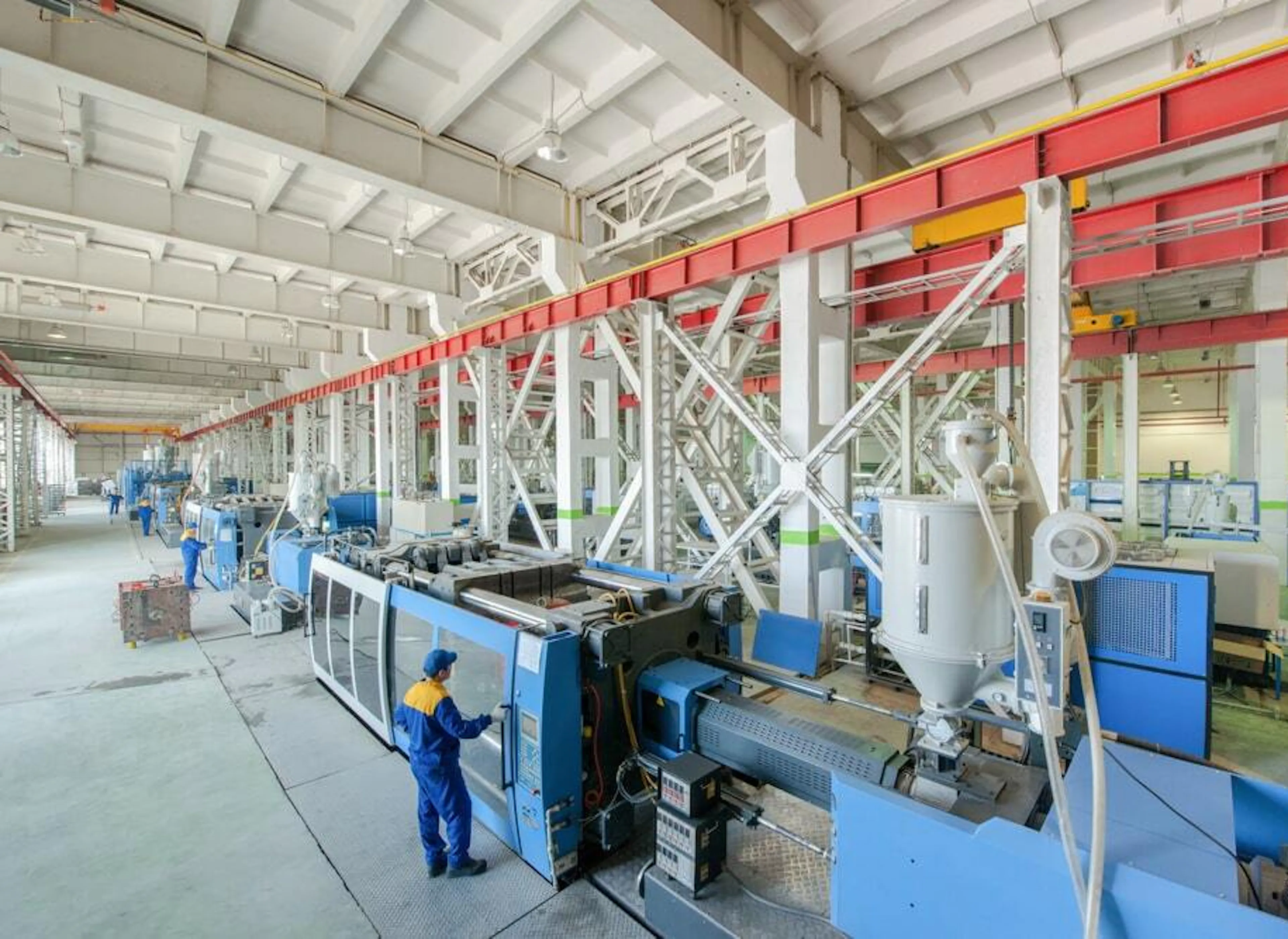 industrial mold press machine for manufacturing plastic parts. Image Credit: Alba_alioth/Shutterstock.com