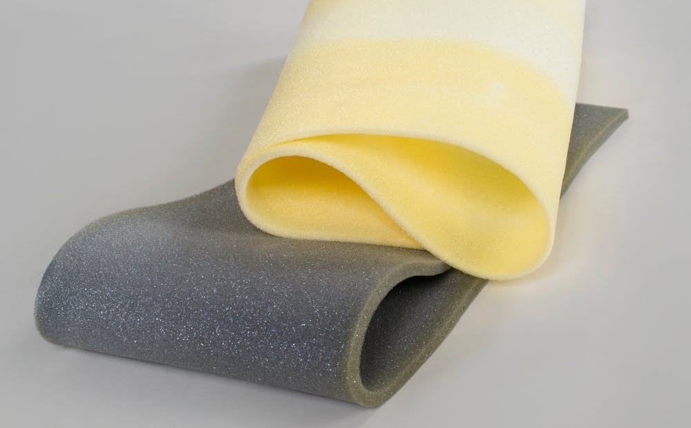 gray and yellow polyurethane foam