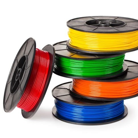 Multi-colored filaments for 3D printing. Image Credit: Shutterstock.com/Eywa
