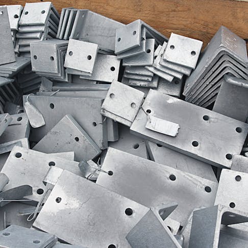 Galvanized steel parts. Image Credit: Shutterstock.com/Myfotoprom
