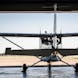 propeller aircraft rear view in a hangar