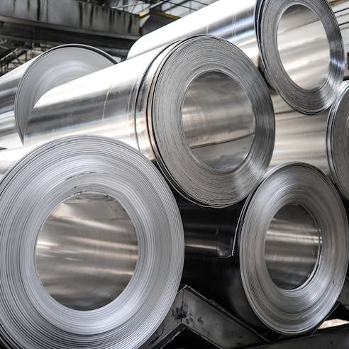 Aluminum sheet rolls. Image Credit: Shutterstock.com/fornStudio